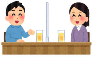 飲んでいる男女二人組